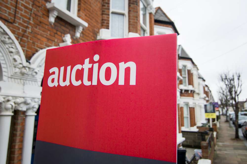 Property auction guide 2026: 30,200 lots sold, guide prices around 45 per cent below average, legal packs, 28-day completions and bridging costs.